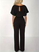 Vid jumpsuit med midjeband