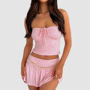 Tvådelat set med kort kjol och topp