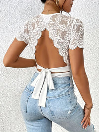 Randig jumpsuit med stickad bar rygg