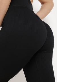 Svart sport shorts med randigt mönster