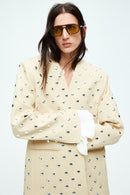 Dilaraa beige avslappnad långärmad jacka