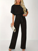 Vid jumpsuit med midjeband