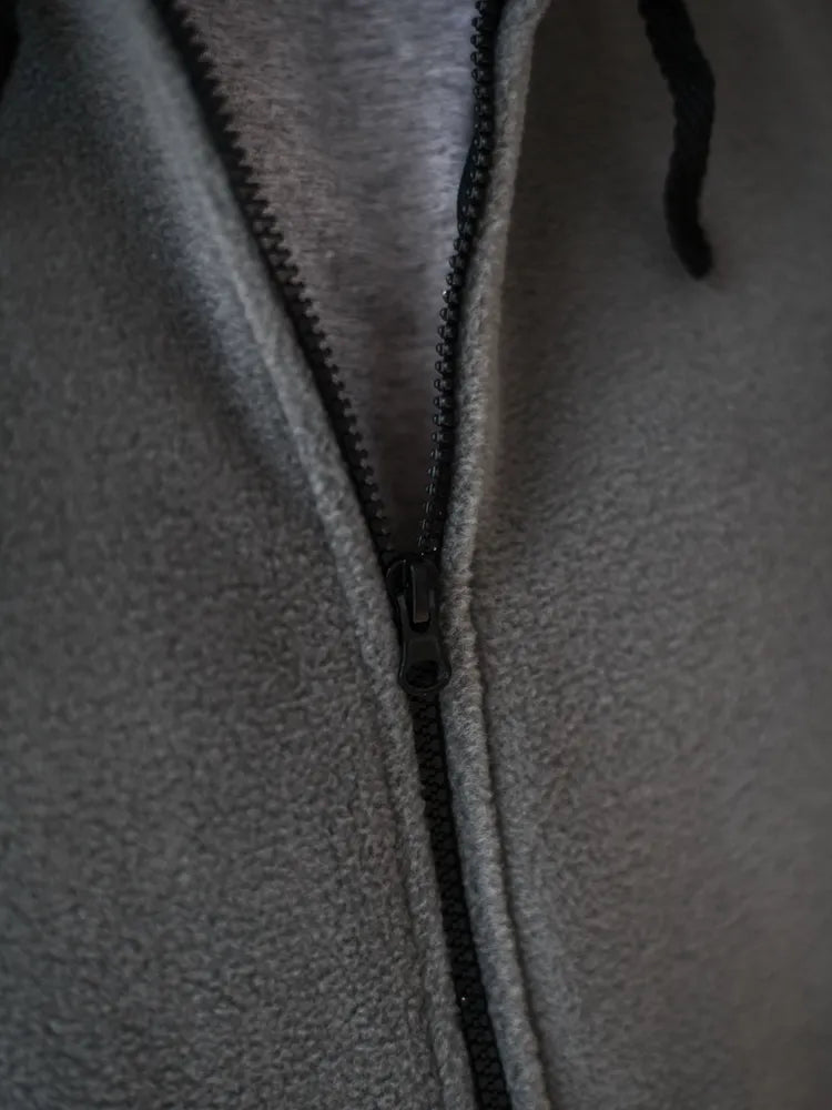 Grå Stil-jacka, med fleece inuti, dragkedja och fickor