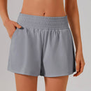 Högmidjade sportshorts med ficka