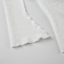 Elegant topp med rosett och bara axlar