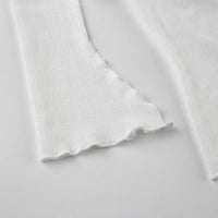 Elegant topp med rosett och bara axlar