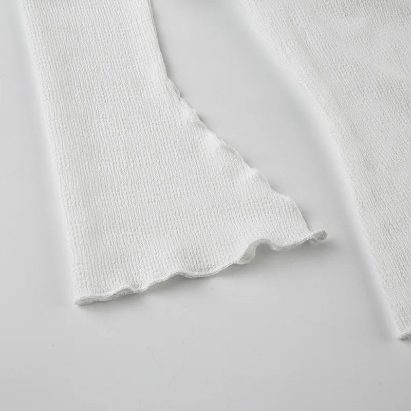 Elegant topp med rosett och bara axlar