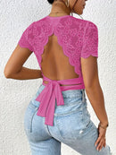 Randig jumpsuit med stickad bar rygg