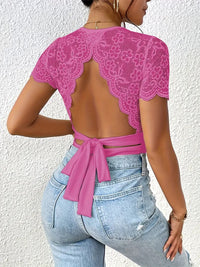 Randig jumpsuit med stickad bar rygg