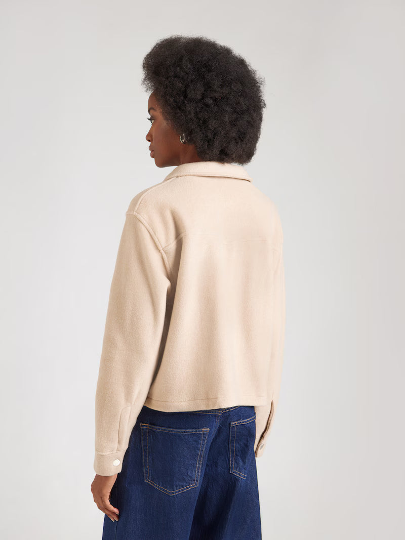 Mavi beige jacka för mellansäsong