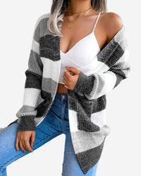 Neyra tröja med rutig design och fickor