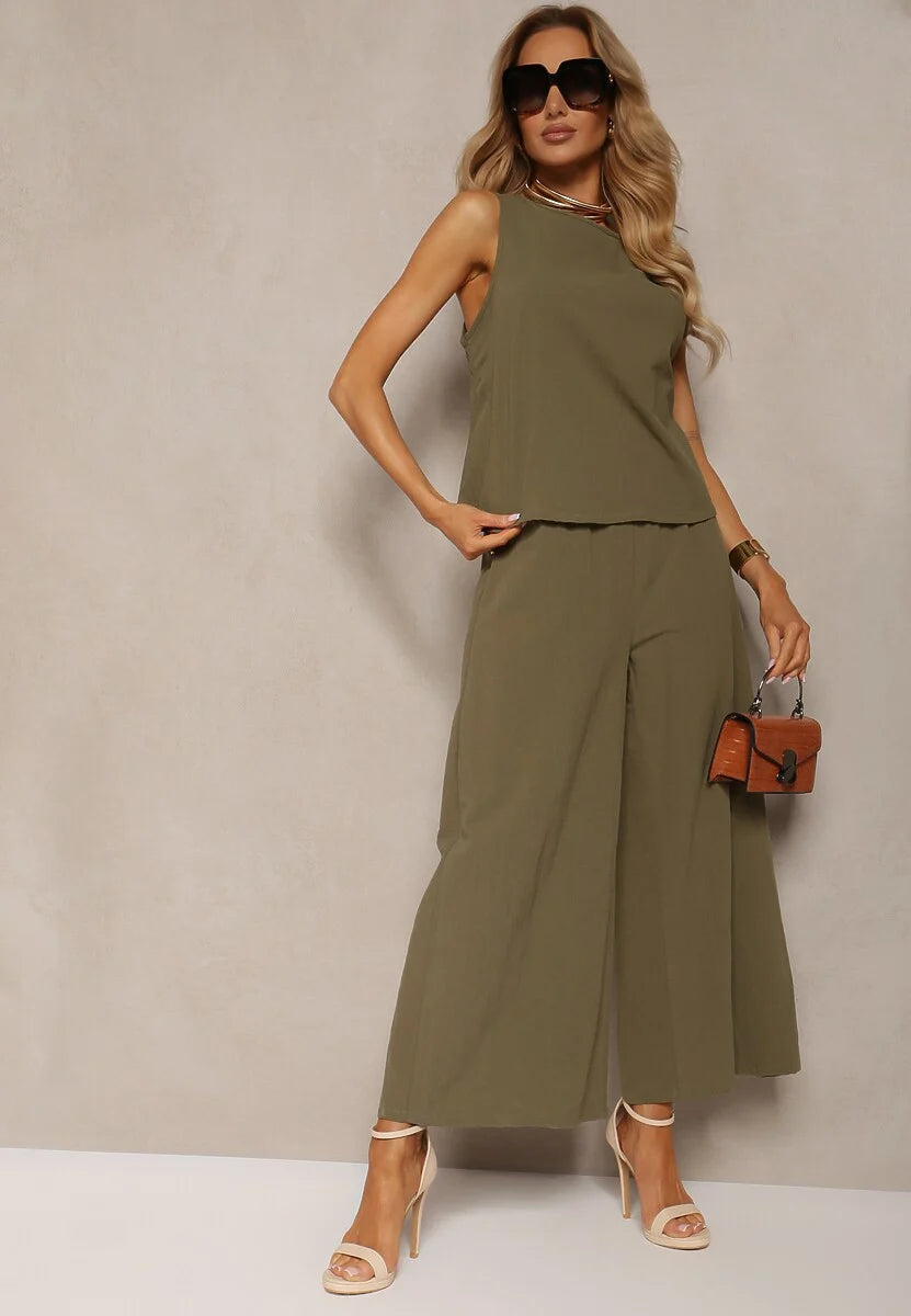 Grön tvådelad kostym, kortärmad jacka och utsvängda byxor