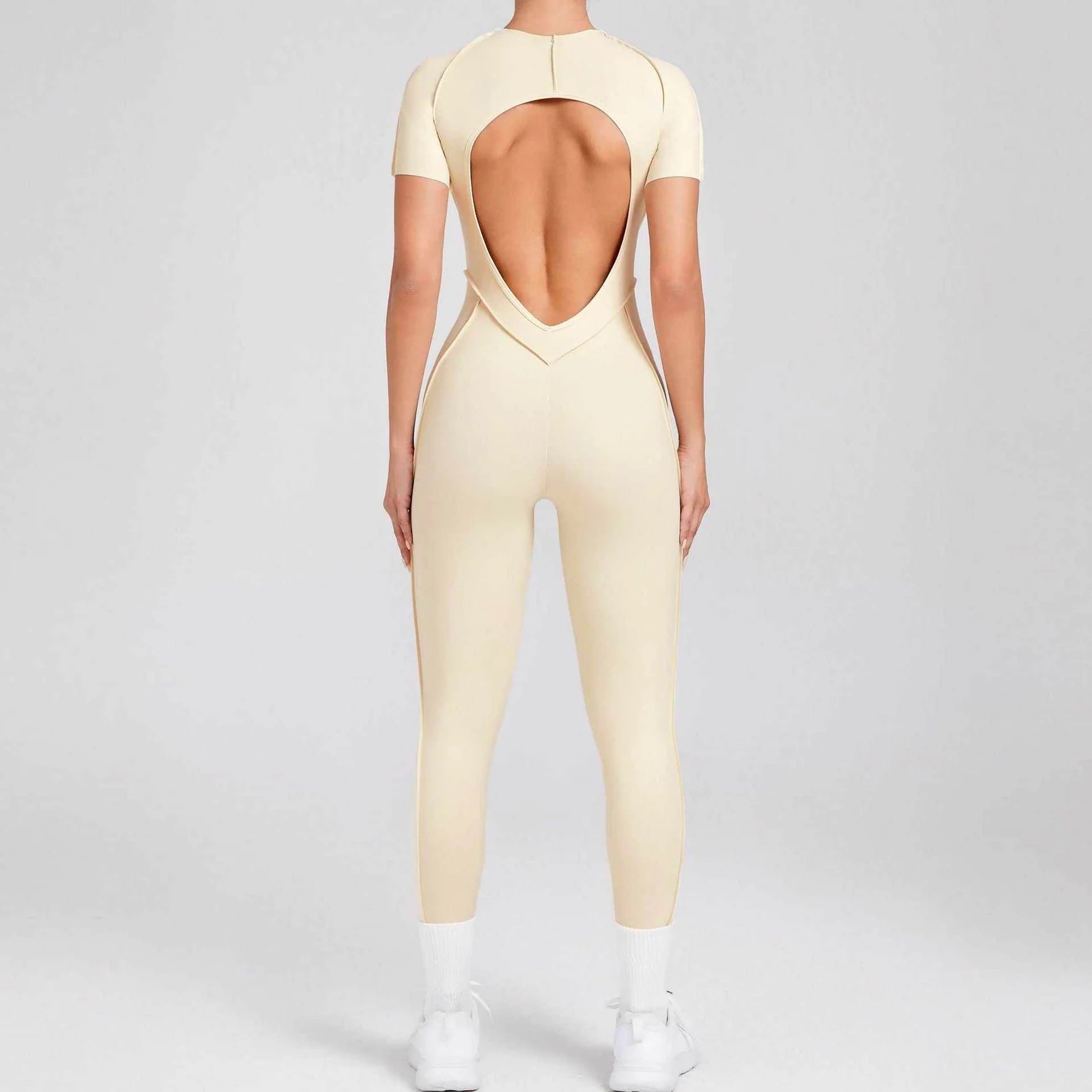 Kortärmade rygglösa sport jumpsuits