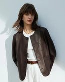 Aurelia mörkbrun äkta skinnjacka, med rund krage, tillverkad av fårskinn, casual