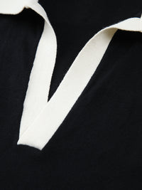 V-ringad tröjväst med kontrastfärgad krage