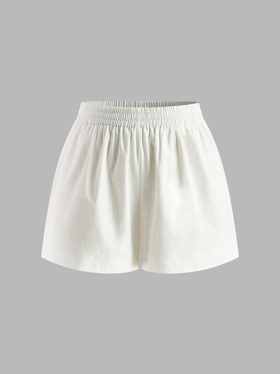 Set med halterneck-topp och shorts utan rygg