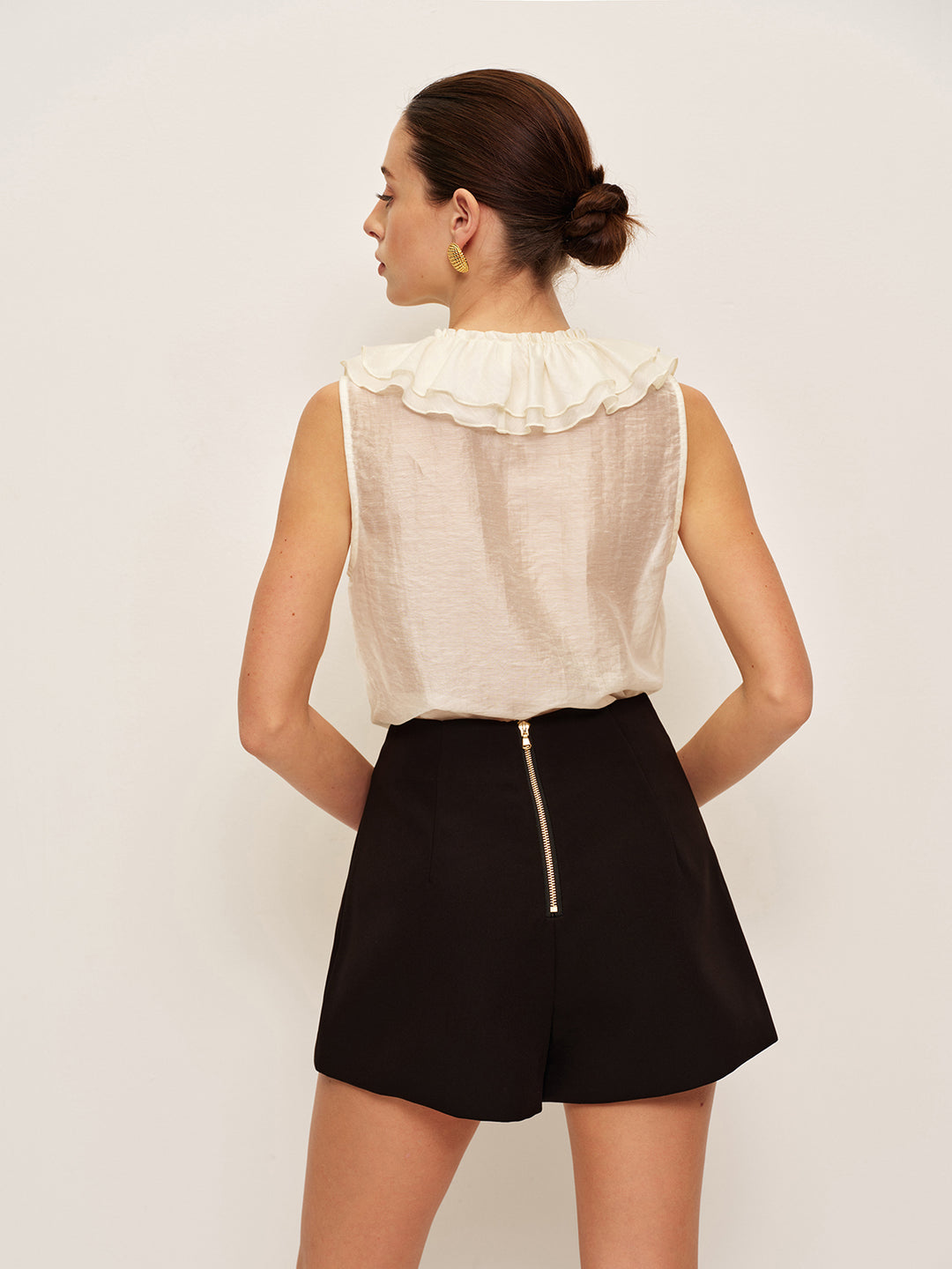 Högmidjade shorts med dragkedja baktill