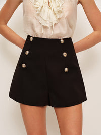 Högmidjade shorts med dragkedja baktill