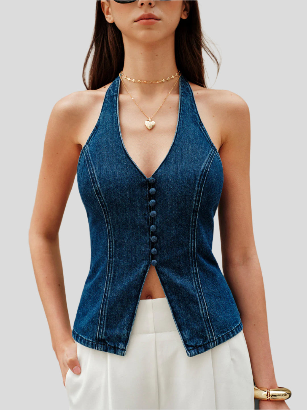 Denimtopp med halterneck-knutdetalj