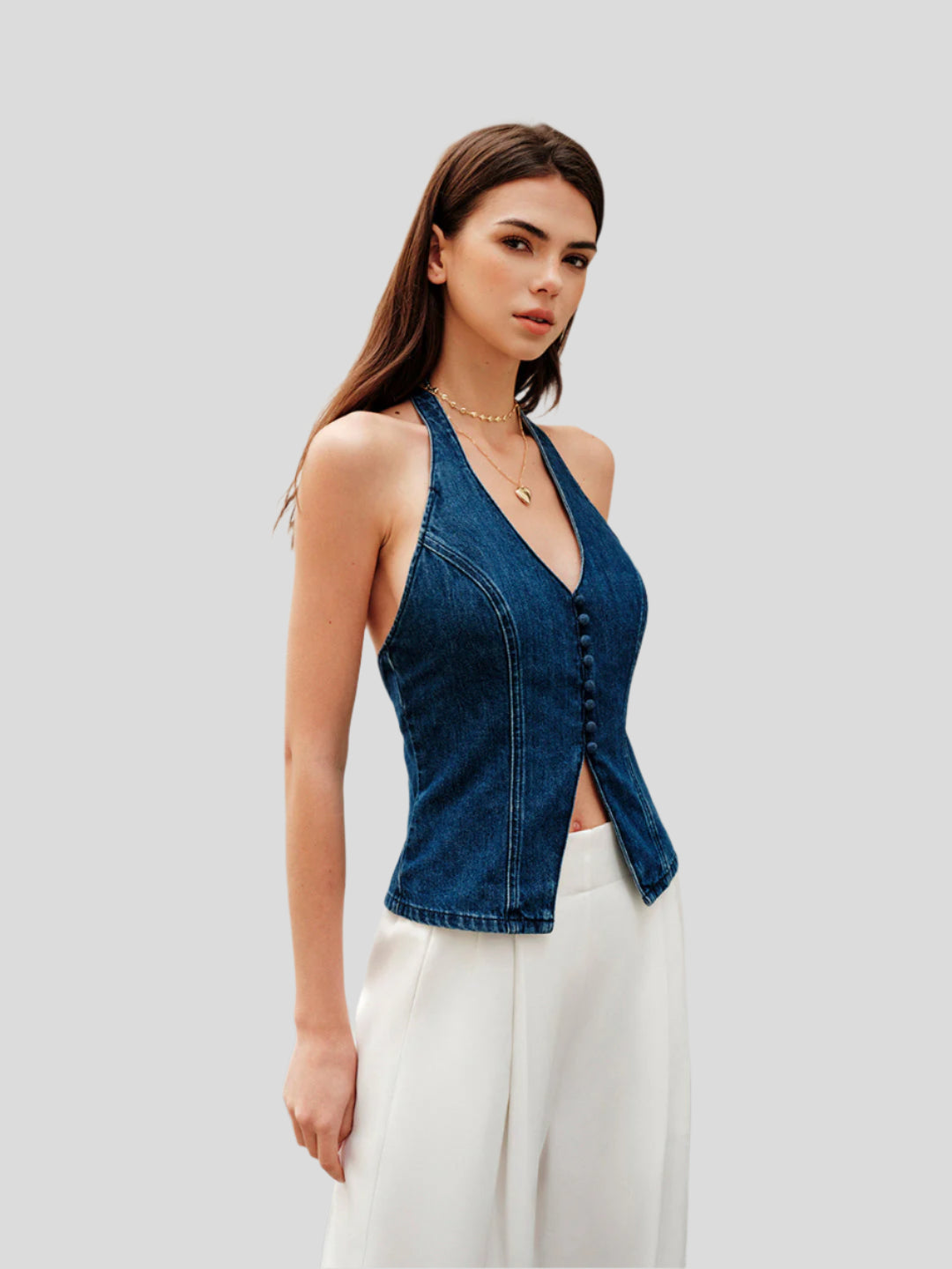 Denimtopp med halterneck-knutdetalj