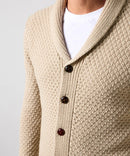 Beige stickad blus med knappar och v-ringning