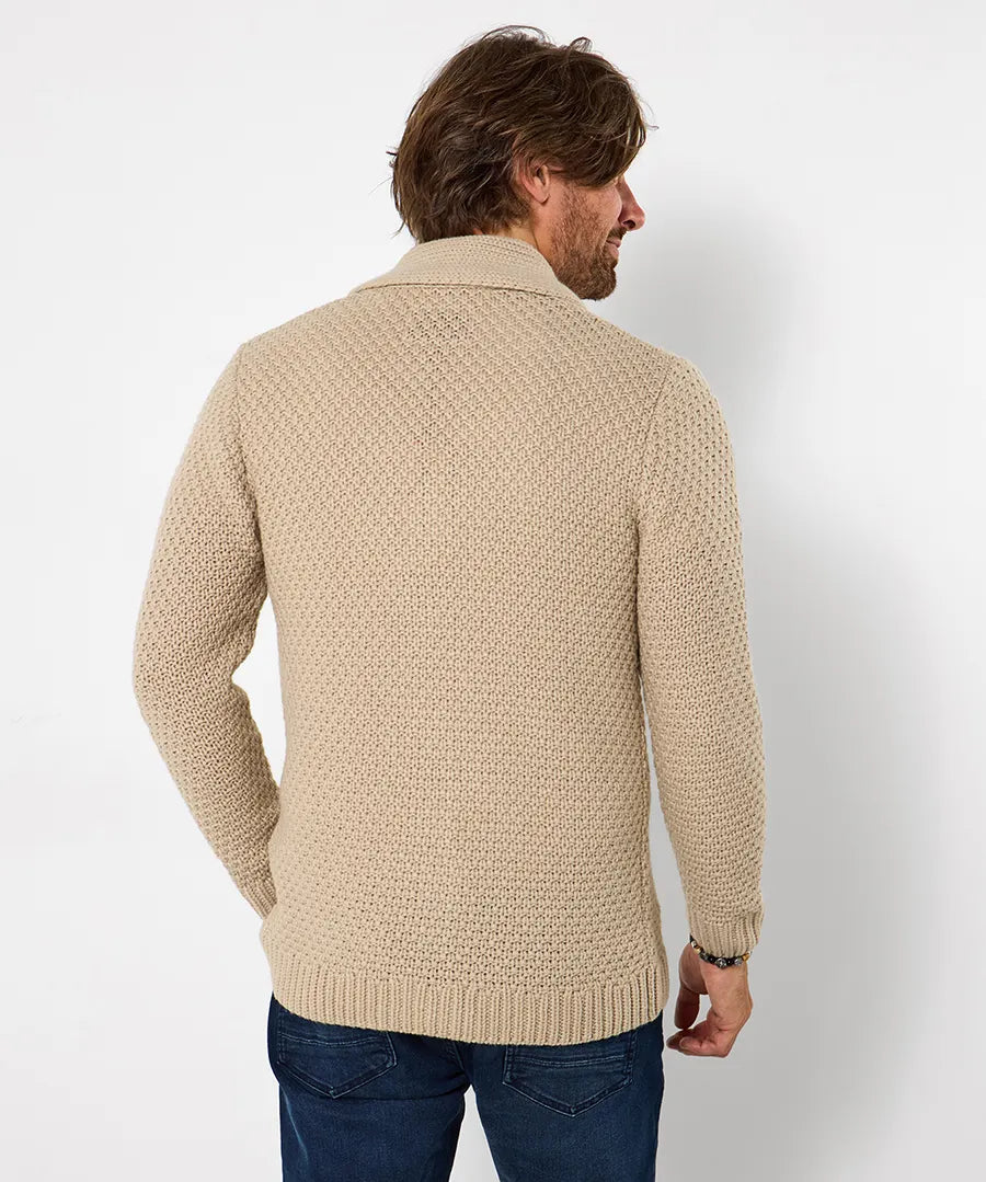 Beige stickad blus med knappar och v-ringning