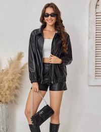 Aleece svart ekojacka med åtstramningseffekt nedtill