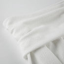 Elegant topp med rosett och bara axlar