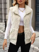 Ärmlös blus med dragkedja och hög krage