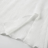 Elegant topp med rosett och bara axlar