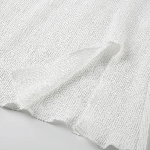 Elegant topp med rosett och bara axlar