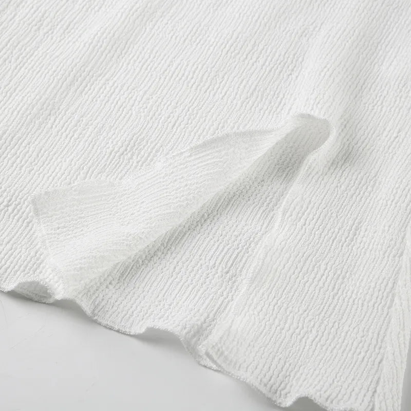 Elegant topp med rosett och bara axlar