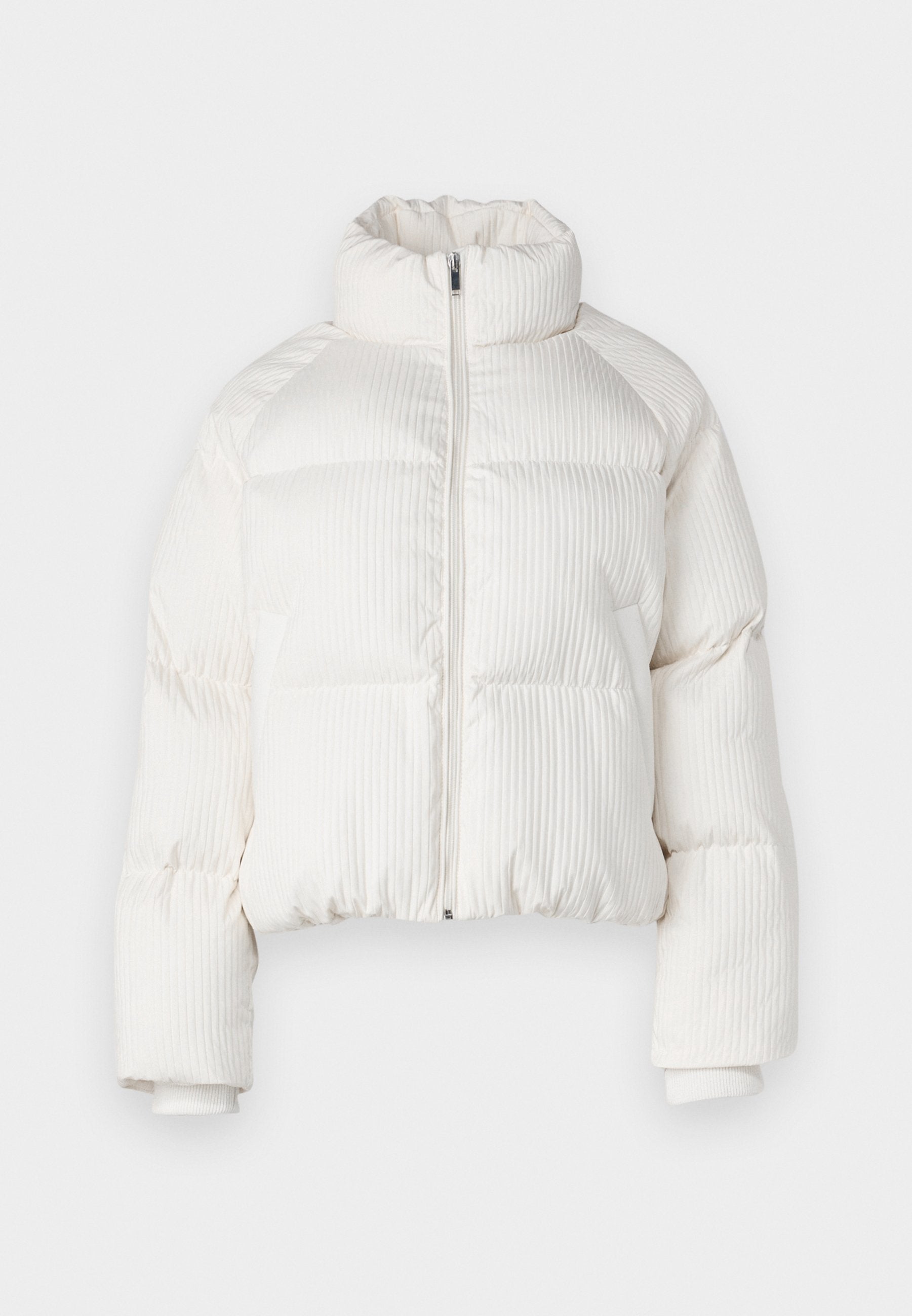 Vadderad jacka med textur