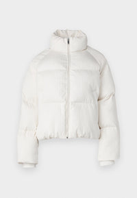 Vadderad jacka med textur