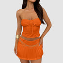 Tvådelat set med kort kjol och topp