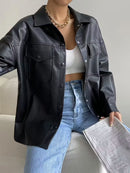 Tessa avslappnad svart enkelknäppt jacka