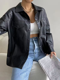 Tessa avslappnad svart enkelknäppt jacka