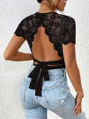 Randig jumpsuit med stickad bar rygg