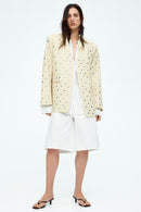 Dilaraa beige avslappnad långärmad jacka