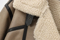 Andyas krämfärgad jacka med dubbel fåll, dragkedja fram och långa ärmar