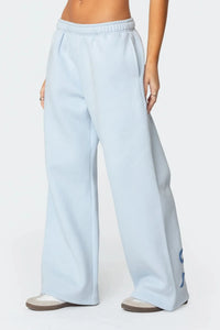 Träningsoverall med huva och rosettdesign