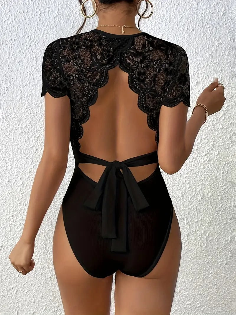Randig jumpsuit med stickad bar rygg