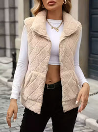 Ärmlös blus med dragkedja och hög krage