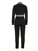 Sportblus och byxor med printdetaljer