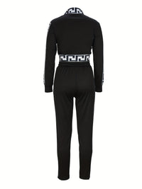 Sportblus och byxor med printdetaljer