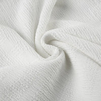 Elegant topp med rosett och bara axlar