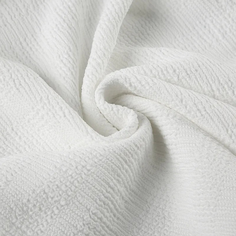 Elegant topp med rosett och bara axlar