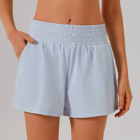 Högmidjade sportshorts med ficka