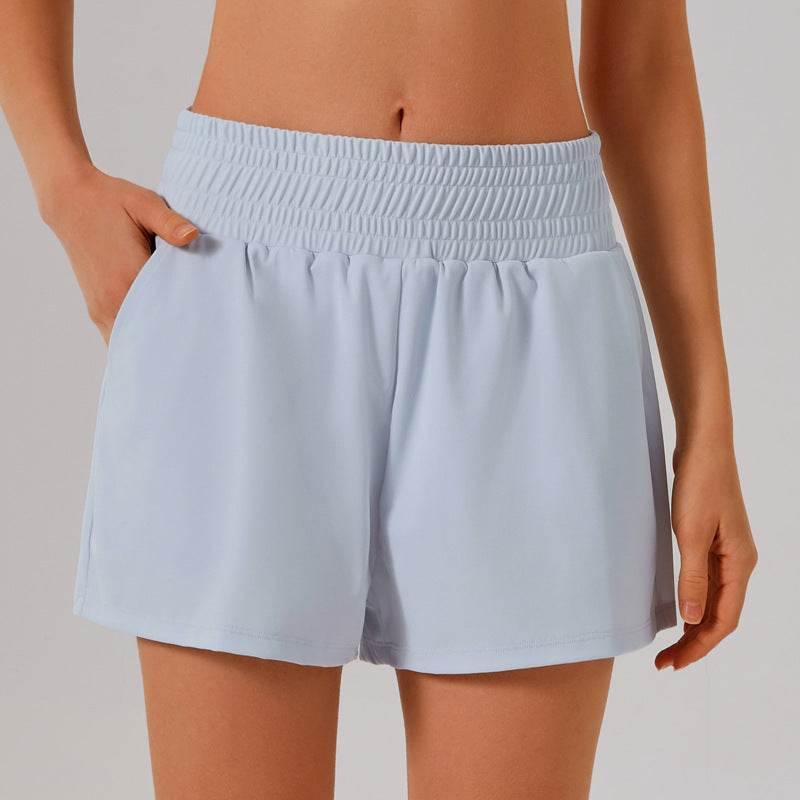 Högmidjade sportshorts med ficka