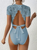 Randig jumpsuit med stickad bar rygg